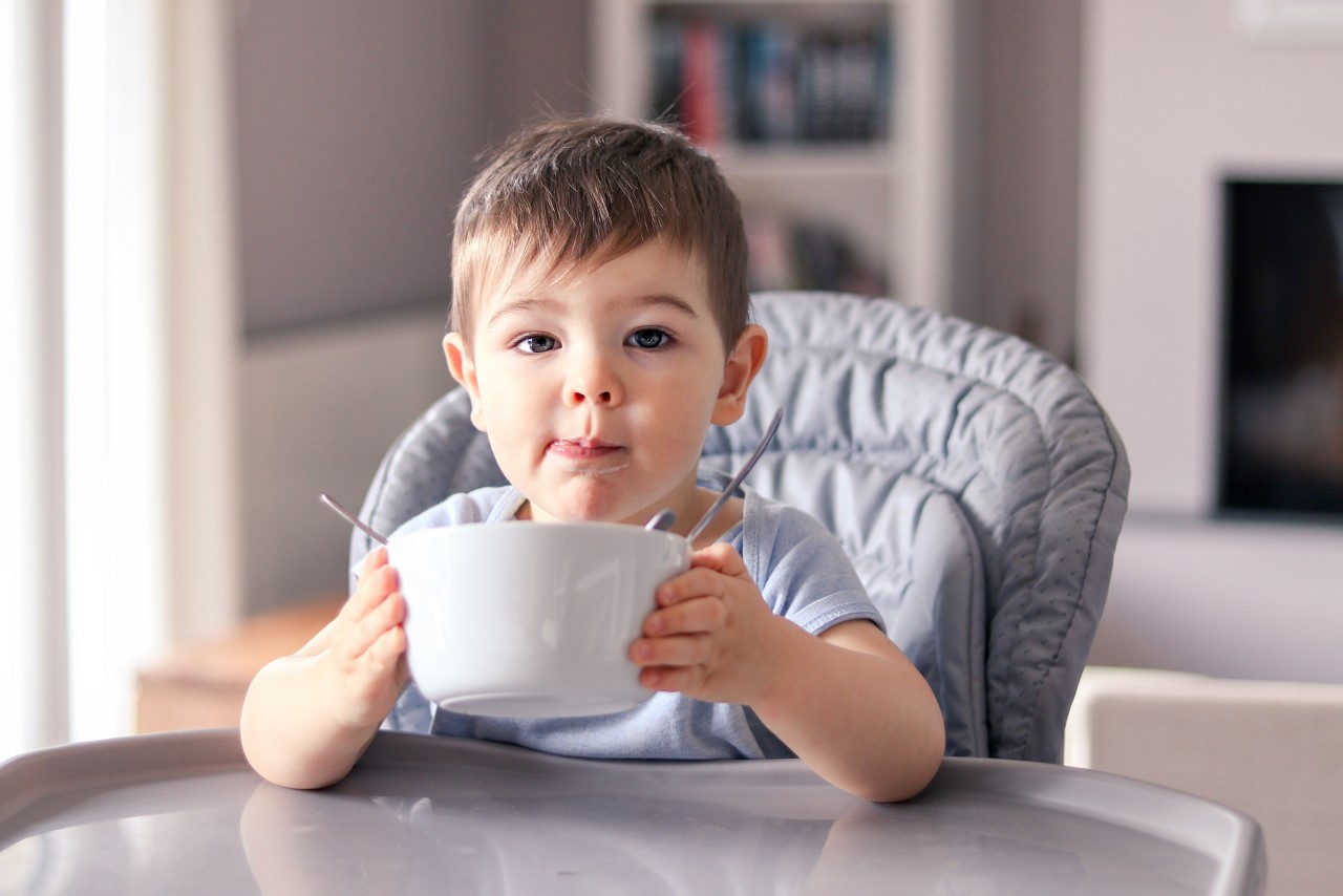 Toddler eating out of the bowl
