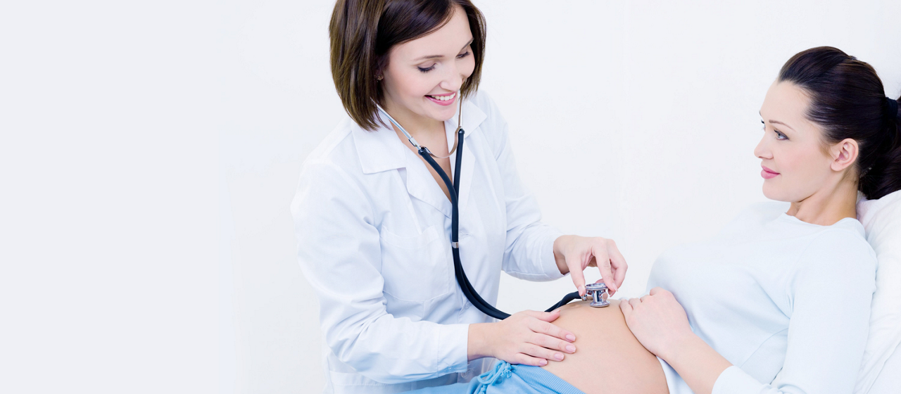 Pregnant woman visiting doctor for healthy check-up