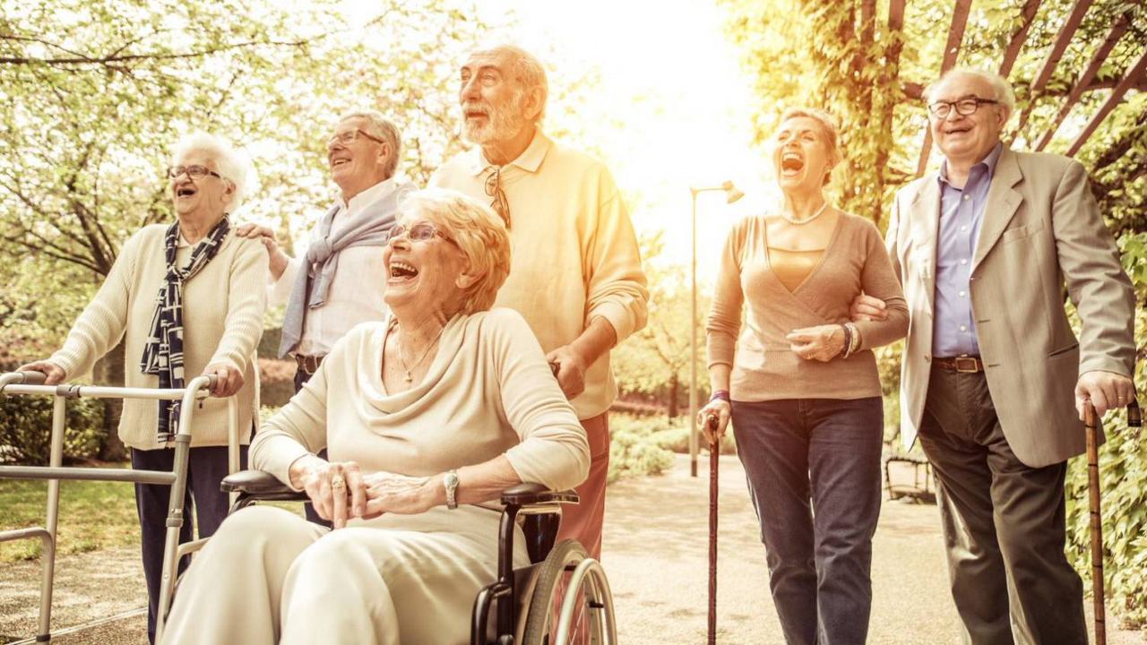 elderly-people-walking-in-sunshine