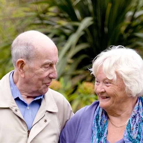 Frailty elderly couple walking together