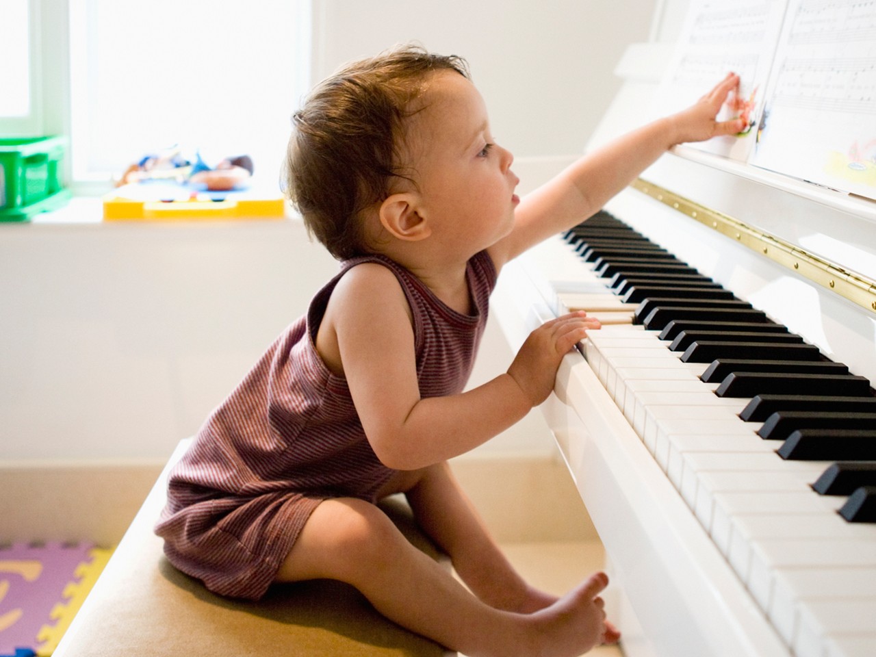 toddler playing the piano