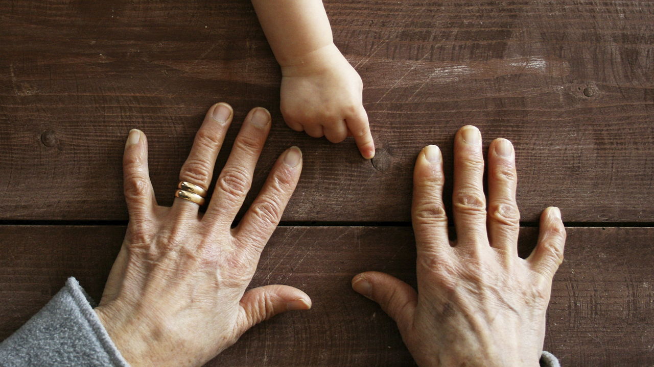 Young and old hands covid adult info page