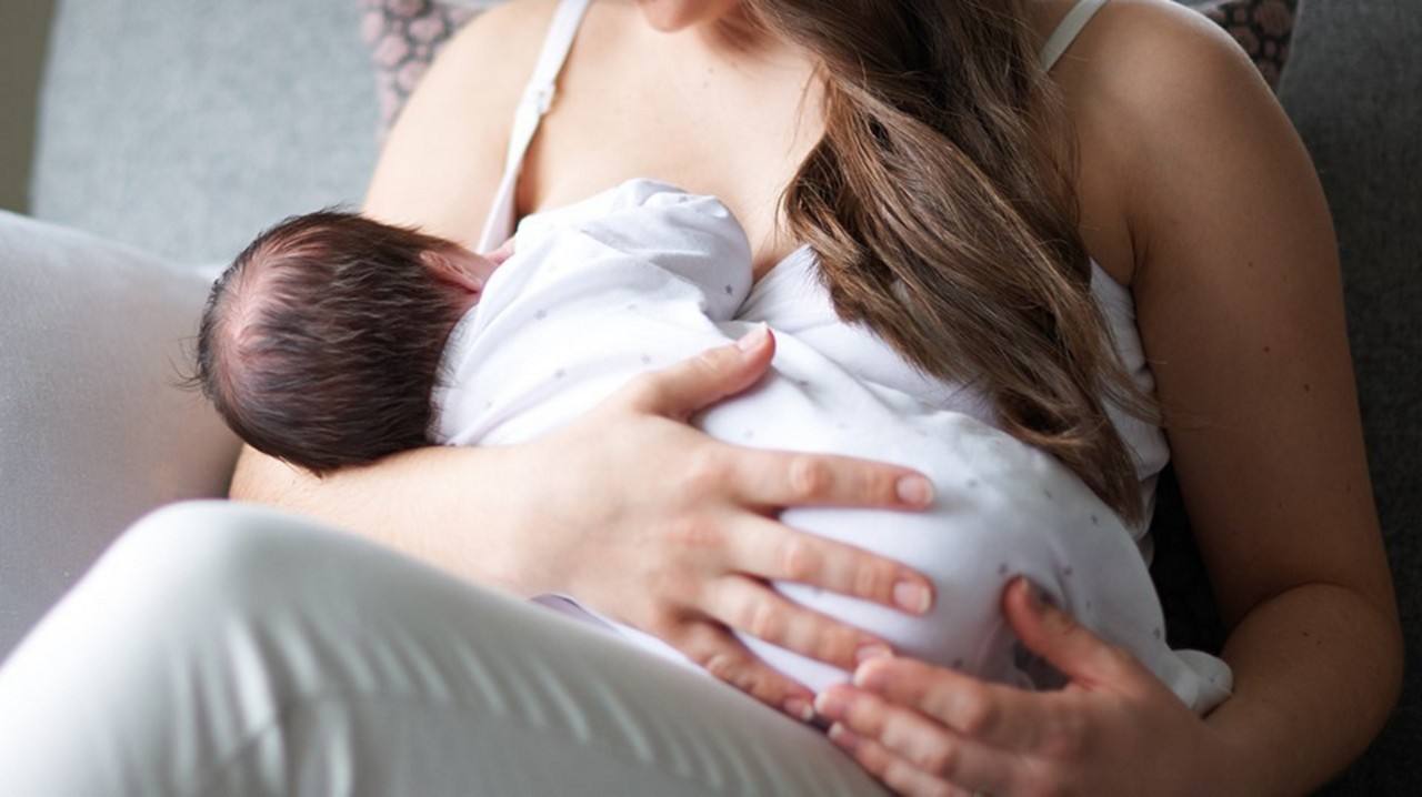 Mother Breastfeeding Newborn