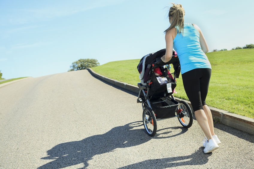 Postnatal exercise woman with pram