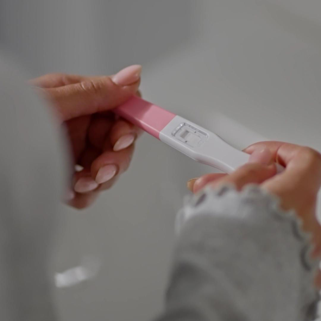 pregnancy test on lap