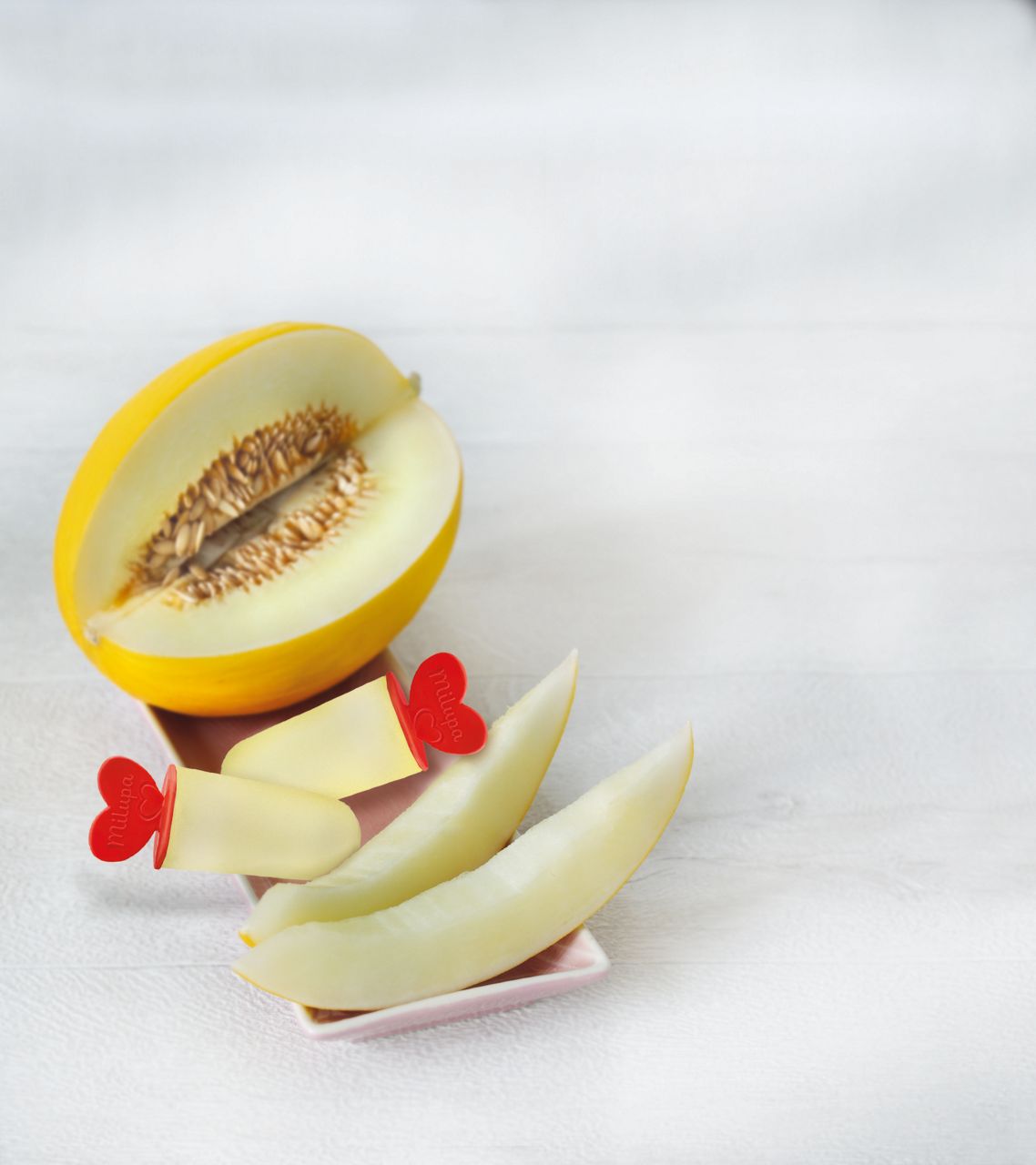 Honigmelone-Kindermilch Eis-Pop