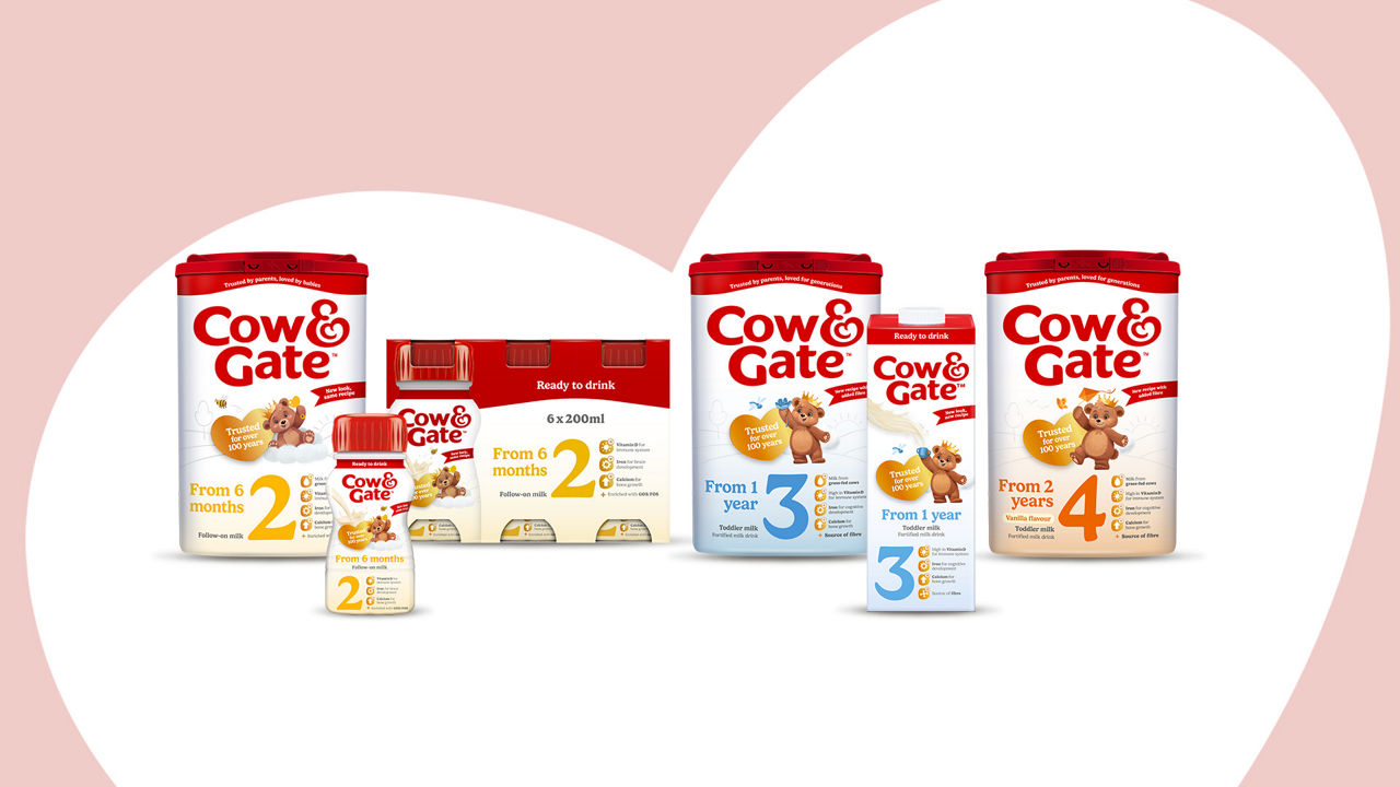 Mum spoon feeding baby