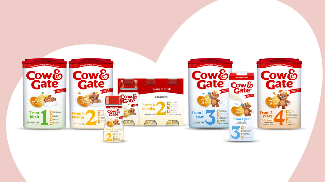 Mum spoon feeding baby