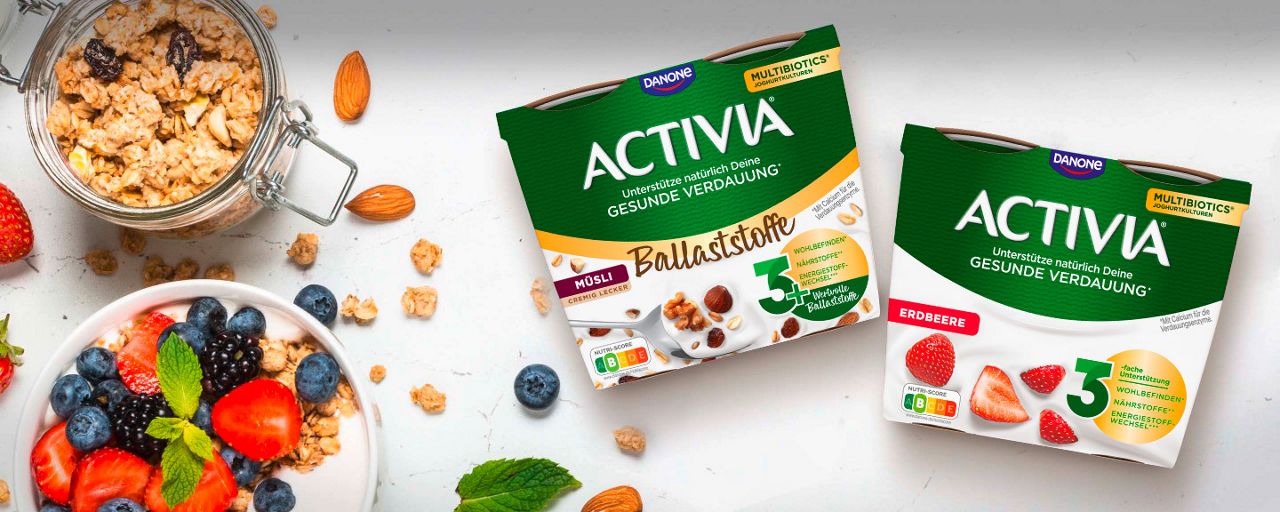 Haferflocken-Activia-Joghurt und Erdbeer-Joghurt-Packung