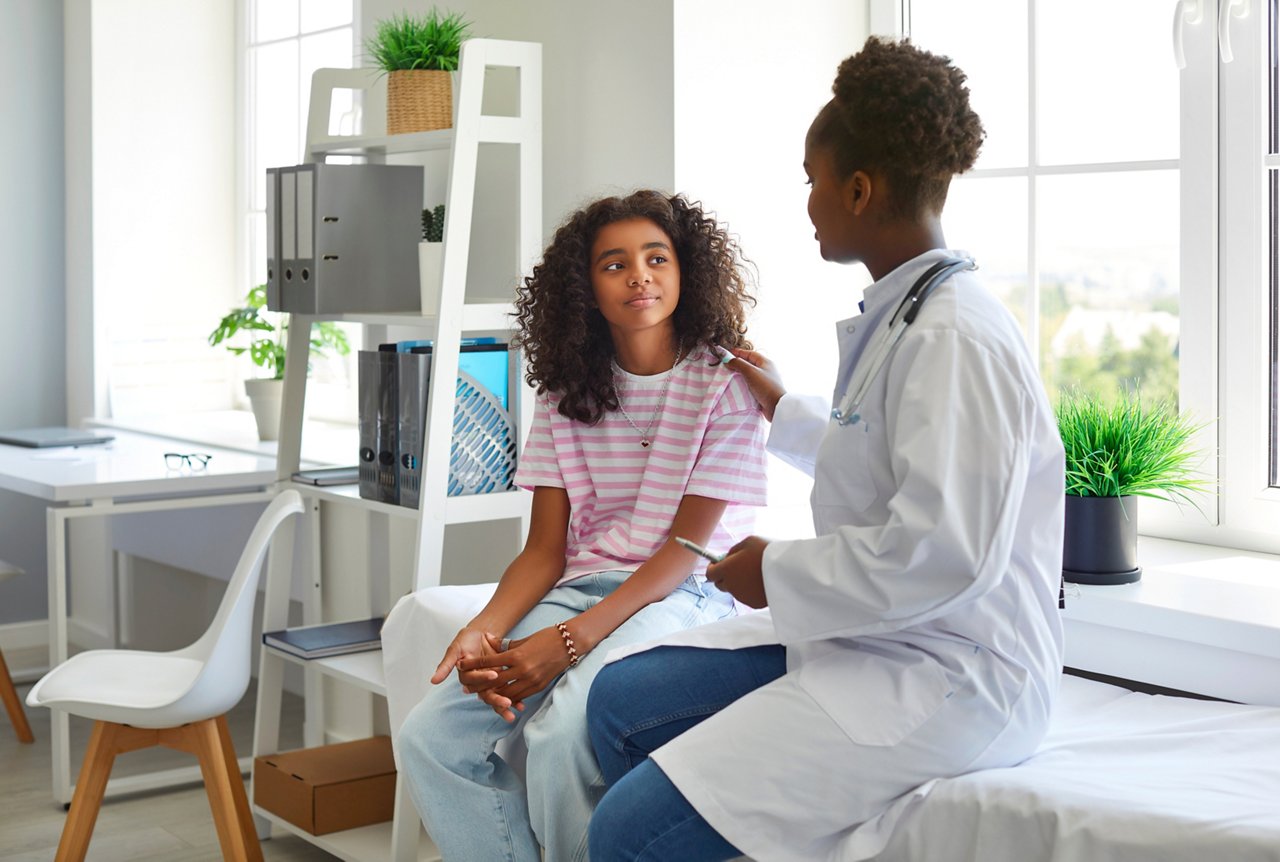 Pediatrician with a teenager