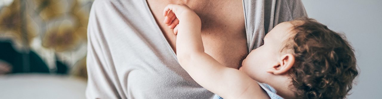 mother breastfeeding baby