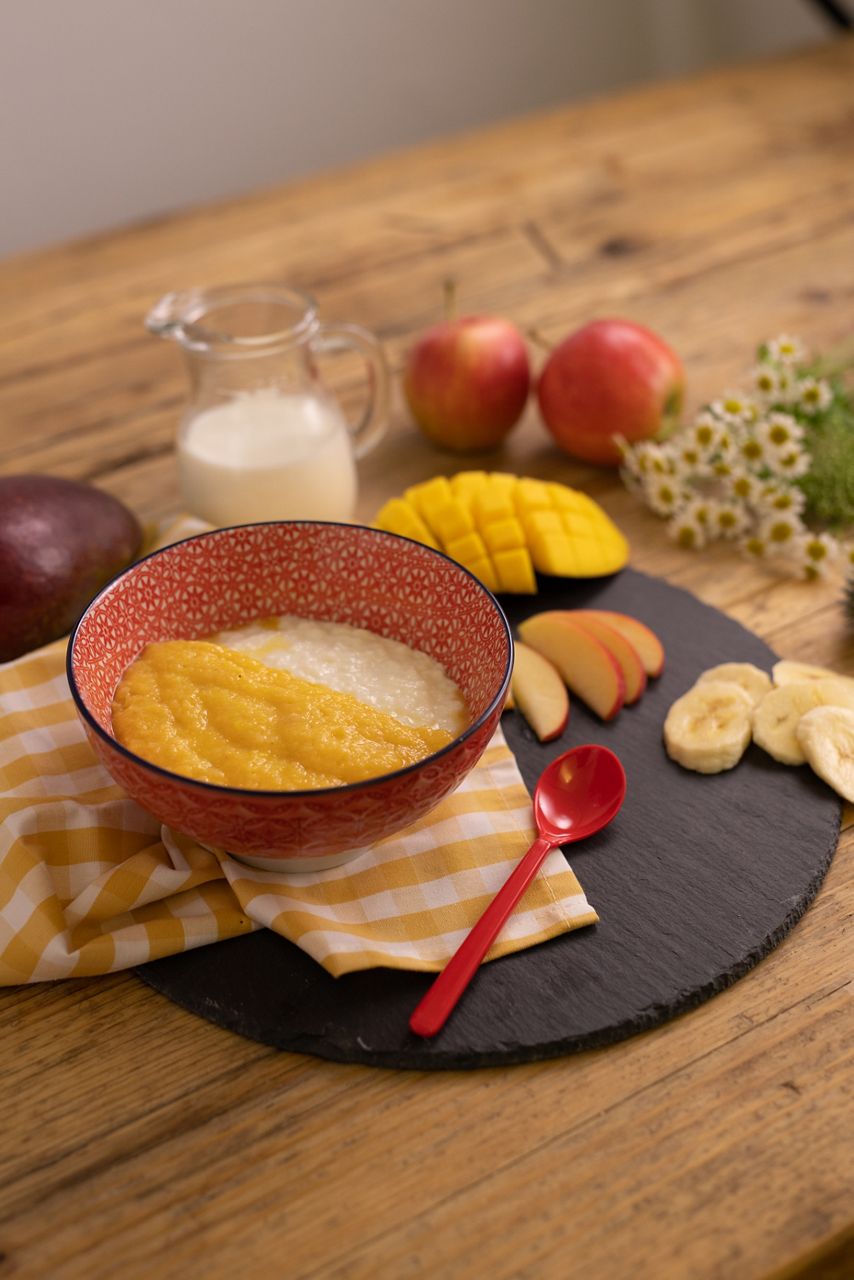 Brei mit Mango und Birne Topping
