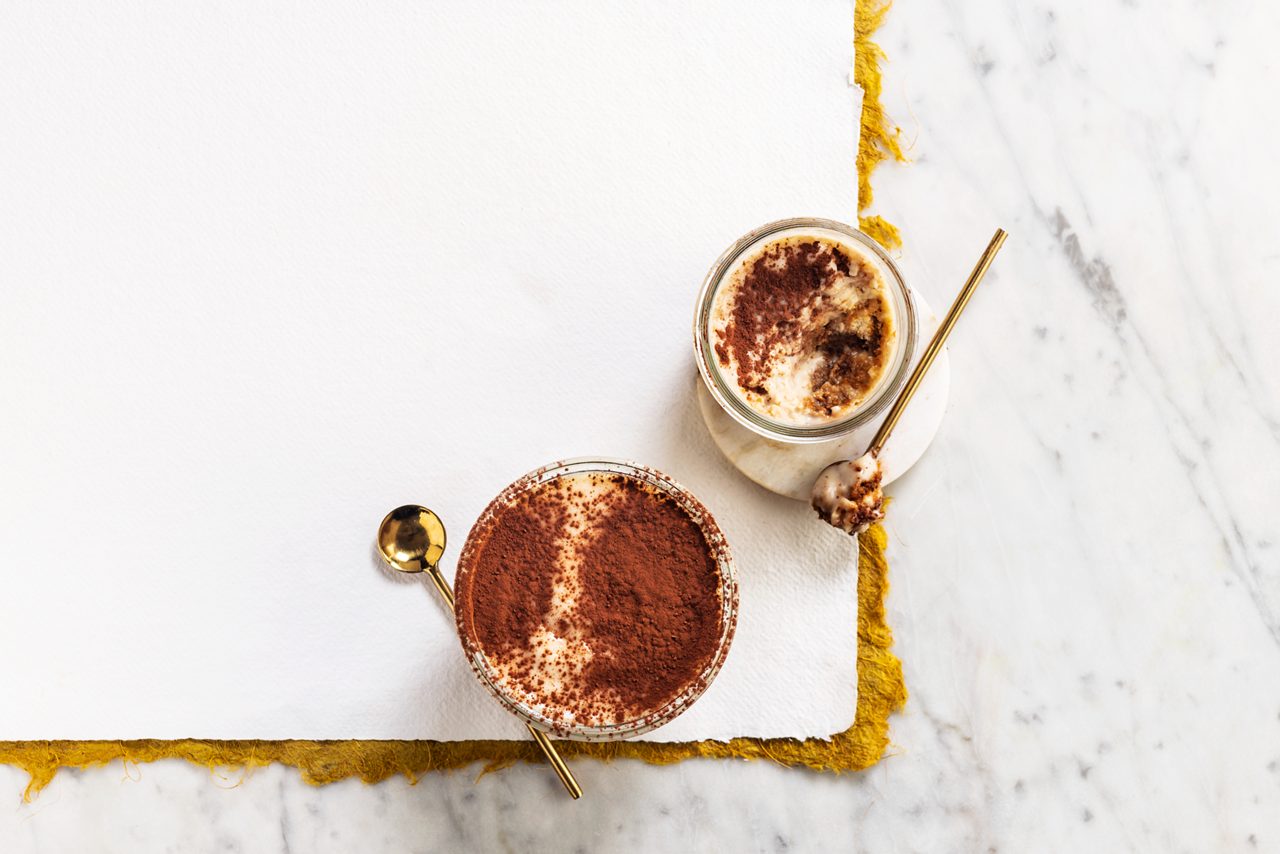 3FC5E059-6D00-4FD8-AA1F840E0DD486A2<br>A_GFY_NA_Global_Recipe_Image____GreekStyle_NA_Oat_NA_Pot_400g_HR_OvernightTiramisu_3x2.tif<br>Overnight oat tiramisu

 Layers of creamy coffee heaven made with Alpro Greek Style oat  

100g rolled oats
400ml Alpro Oat drink 
150 g Alpro Greek Style oat + extra for topping
2 tbsp maple syrup
6-8 ladies fingers biscuits 
4 Espresso coffees
Unsweetened cacao powder

1. Mix together the oats, Alpro Oat drink, thick and creamy Alpro Greek Style Oat and maple syrup. Pop into the fridge and chill overnight. 
2. Next morning, make 4 espressos and quickly dip the ladies' fingers into the coffee. 
3. Layer half of them into the bottom of 4 large glasses or, uber cool, mason jars. Add a dusting of cocoa and a layer of the overnight oats. Repeat with another layer of the dipped biscuits, cocoa and oats, and finish with Alpro Greek style oat and cocoa powder on top. 
4. Keep covered and chilled until you're ready to serve. Deeeelish with a capital D!

(Recipe type: Breakfast/dessert (Prep time: 10 min) (baking time: ) (cooling time: overnight) (servings: +/- 3 persons) (season: all season)

Caption: 
“No tiramisu for me, thanks” said nobody. Ever. And when served up with a plant-based twist, this Italian classic is a t-oat-al crowd pleaser! (2x heart-eyes emoji)