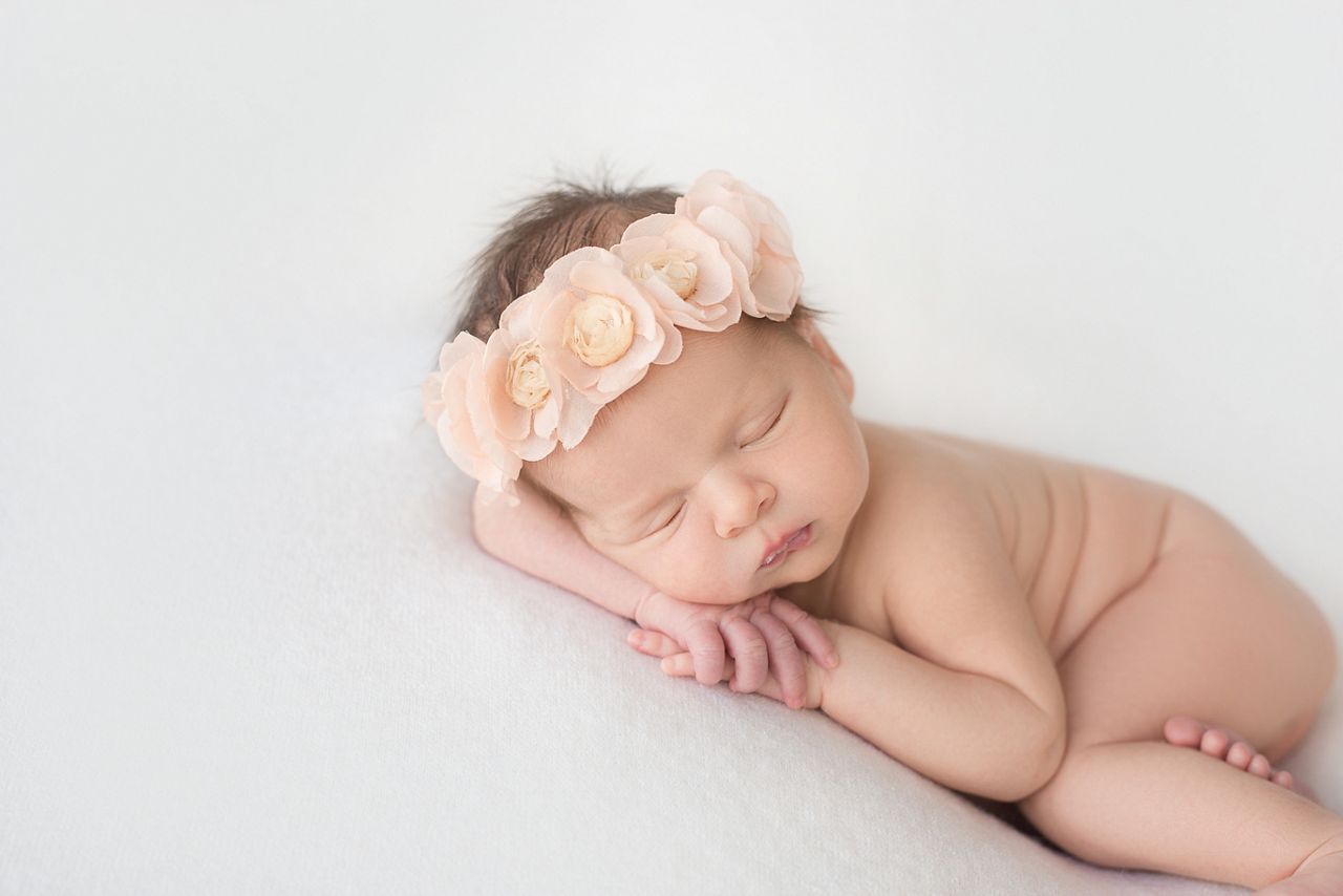 sleeping newborn baby on a blanket