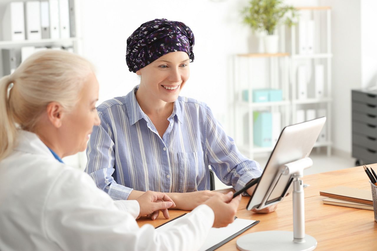 Woman after chemotherapy visiting doctor in hospital