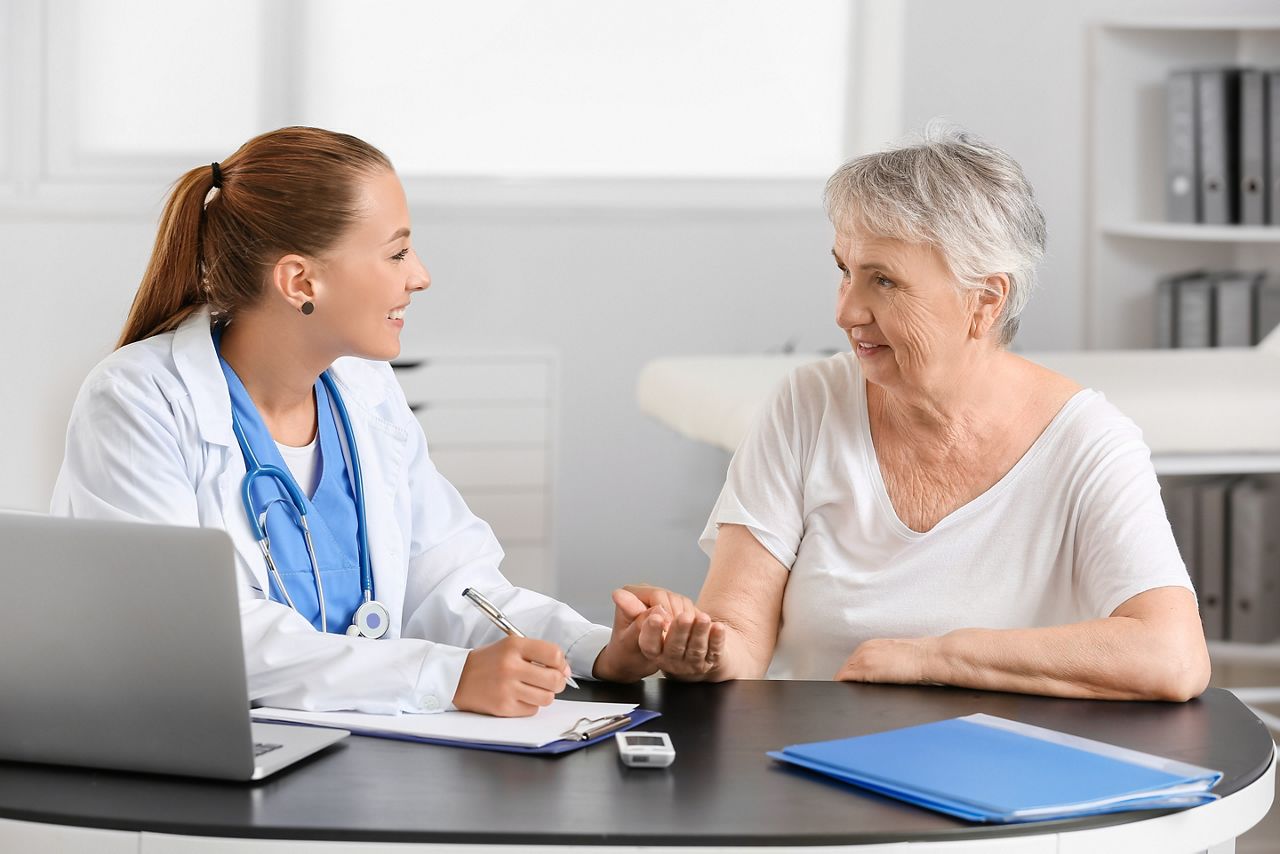 Senior diabetic woman visiting doctor in clinic