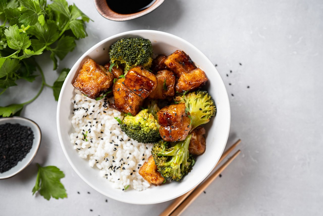  Healthy tofu bowl with broccoli and rice 