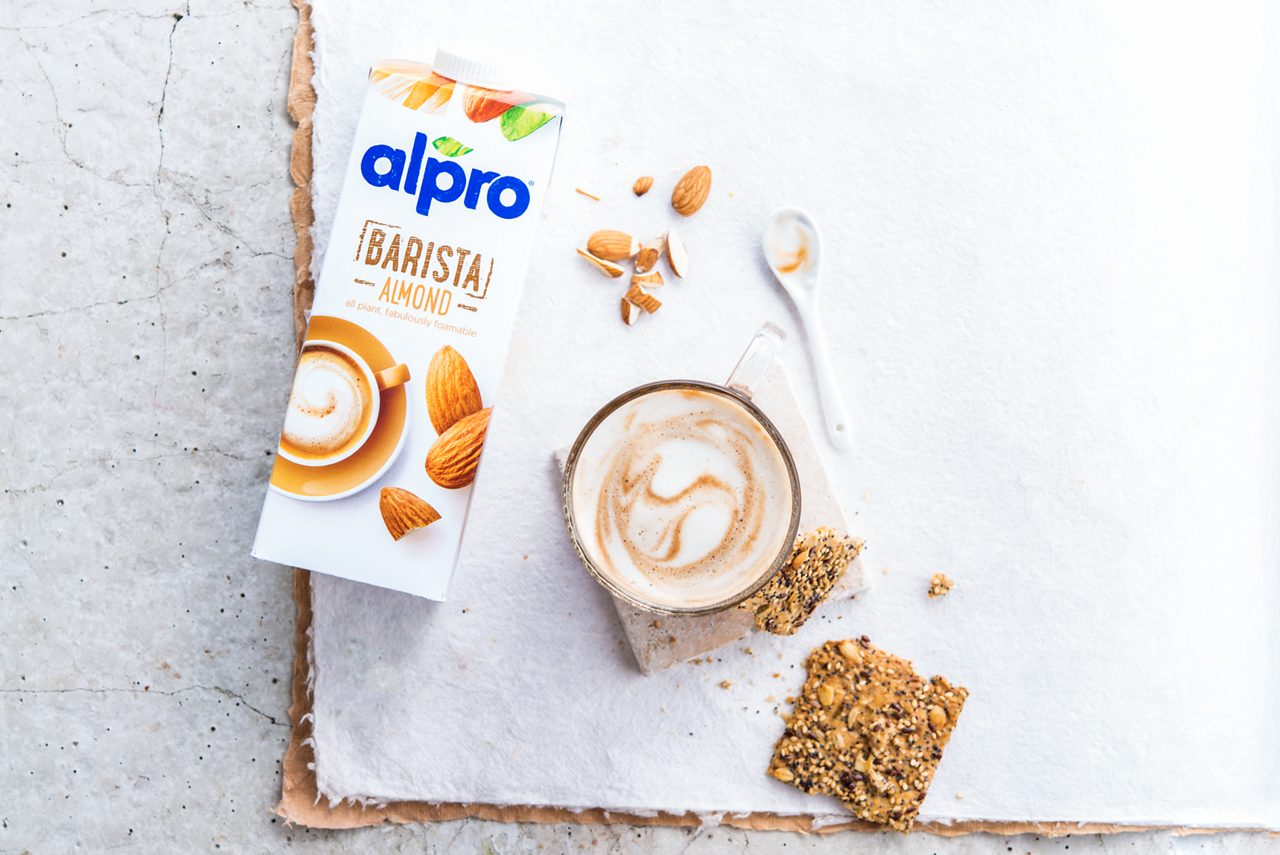 29C2748E-3549-4611-B1974064C96879B2<br>A_AlmondDrink_NA_Master_Recipe_Image_lattemacchiatopackshot___Drinks_Barista_Almond_NA_TetraUHT_1l_HR_horizontal.tif<br>Almond Latte Macchiato

A sophisticated latte macchiato designed to impress your friends, with Alpro Barista Almond Drink

"800ml Alpro Barista Almond Drink
4 espressos or strong coffees"

"1.	Make four espresso shots, or four small cups of good strong coffee. 
2.	Gently heat the Alpro Barista Almond Drink (careful not to boil!), stirring constantly. 
3.	Whisk until it forms a light and frothy foam, just like it was designed to do. 
4.	Divide the whipped Alpro Barista Almond Drink between four glasses and slowly, slowly pour over the espresso or coffee, taking care to keep those lovely layers in place. A stylish way to spark up your day, or serve it with an elegant little biscuit when it’s time for a mid-morning pick me up."