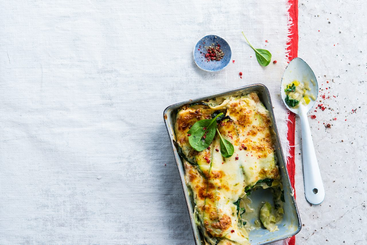 D2B17B9E-D935-4297-B8DED98B575F2B5C<br>A_NoSugars_NA_Master_Recipe_Image_vegetablelasagna___Drinks_Unsweetened_Soy_NA_TetraUHT_1l_HR_horizontal.tif<br>Mean Green Veggie Lasagne

Easy-peasy pasta layers with creamy veg and Alpro Soya Unsweetened Drink

"250ml Alpro Soya Cuisine 
150ml Alpro Soya Unsweetened Drink
1 shallot
2 courgette
2 leeks
2 cloves of garlic
Tarragon
200g spinach
1/2 lime 
250g mozzarella, grated
16 fresh lasagne sheets
A pinch of nutmeg
Sea salt and white pepper"

"1.	Preheat your oven to 180ºC. Finely dice the shallot, leeks and garlic. Thinly slice the courgette lengthwise. 
2.	Make the yummy sauce. Fry the shallot, garlic and leek until the shallot is translucent. Add the spinach and cook just until it’s wilted. Add the Alpro Soya Cuisine and Alpro Soya Unsweetened Drink and season with sea salt, pepper, tarragon, nutmeg and lime until it tastes just how you like it.
3.	Arrange alternating layers of sauce, lasagne leaves, zucchini slices and half the mozzarella in a baking dish and scatter the rest of the mozzarella over the top.
4.	Bake on the middle rack for about 30 minutes until golden brown and bubbling.  
An easy win dinner that’s sure to be a family favourite! "