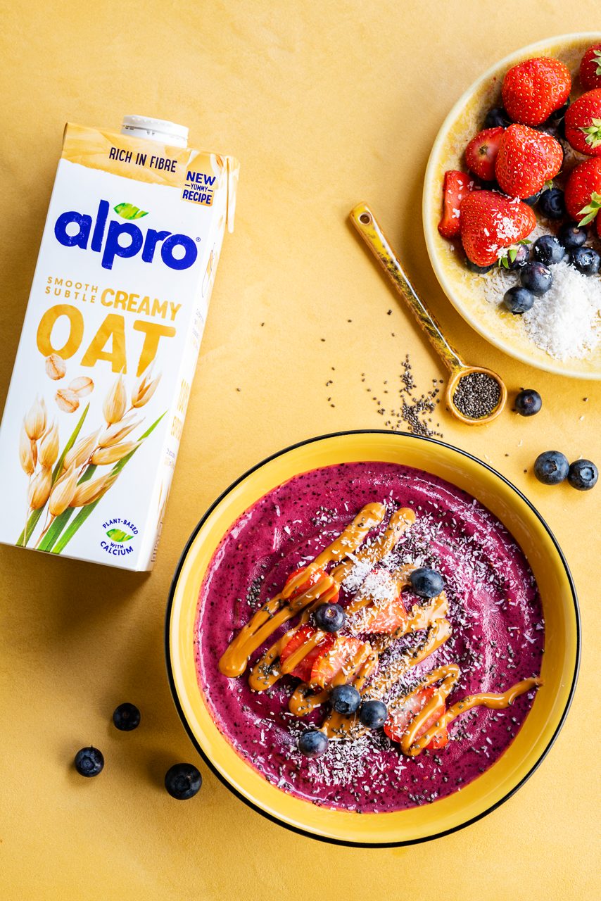 48116993-76AD-4C93-BEE4A3ADF0921885<br>A_NA_NA_Master_Recipe_Image_Breakfastsmoothiebowl ___Recipe_NA_Drinks_origins_Oat_NA_TetraUHT_1l_HR_-279.tif<br>Berry_ smoothie_ bowl_title	Berry smoothie bowl
Berry_ smoothie_ bowl_subtitle	Like it quick and simple? Try this all-in-one berry blend made with Alpro Oat drink.
Berry_ smoothie_ bowl_ingredients	"300ml Alpro Oat drink 
500g mix of frozen strawberries, raspberries and blueberries
1 banana
1 tbsp maca powder 
1 tbsp all-natural peanut spread

Topping: 
3 tbsp mix of black chia seeds and desiccated coconut 
8 strawberries
Handful of blueberries
Extra peanut spread "
Berry_ smoothie_ bowl_preparation	"1. Put your frozen berries, banana, maca powder and peanut spread in a blender. 
2. Splash in the Alpro Oat drink. 
3. Whizz until smooth, but still frozen. If it's too runny, add some more berries. If it's too thick, just top it up with some more drink. 
4. Pour into a bowl and scatter with strawberries, blueberries, chia seeds and desiccated coconut, then finish with an extra dollop of peanut spread. Wakey, wakey, taste buds! """
Berry_ smoothie_ bowl_tags	lactose free, veggie, vegan, gluten free
Berry_ smoothie_ bowl_url	/Berry-smoothie-bowl
Berry_ smoothie_ bowl_info	(Recipe type: BREAKFAST/SNACK (Prep time: 10min) (servings: 4 bowls ) (season: all year)
Berry_ smoothie_ bowl_lactosetip	/
Berry_ smoothie_ bowl_veggietip	/
Berry_ smoothie_ bowl_trendtip	/
Berry_ smoothie_ bowl_glutentip	/
Berry_ smoothie_ bowl_product	Alpro oat
Berry_ smoothie_ bowl_searchterms	Alpro, Alpro recipe, breakfast, oats