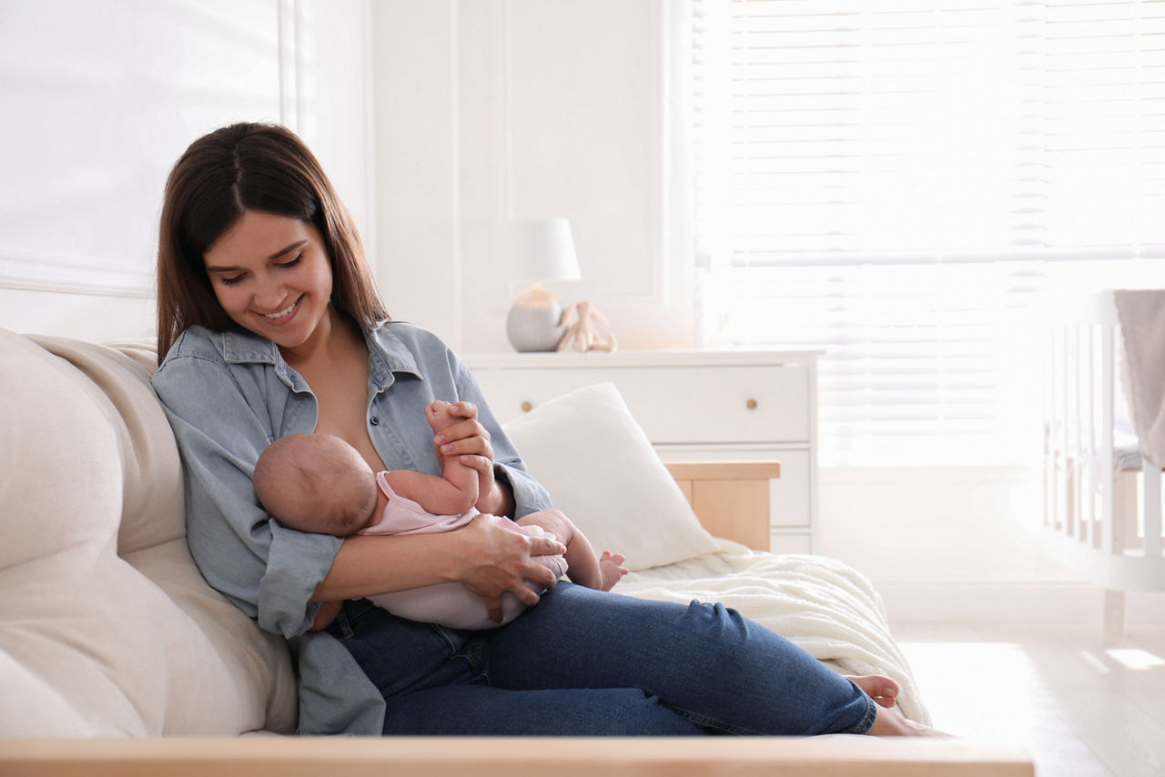 Mother breastfeeding baby