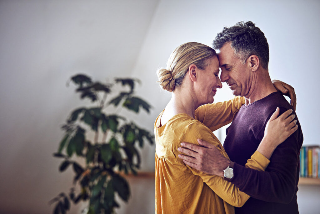 Cropped shot of an affectionate mature couple in their home