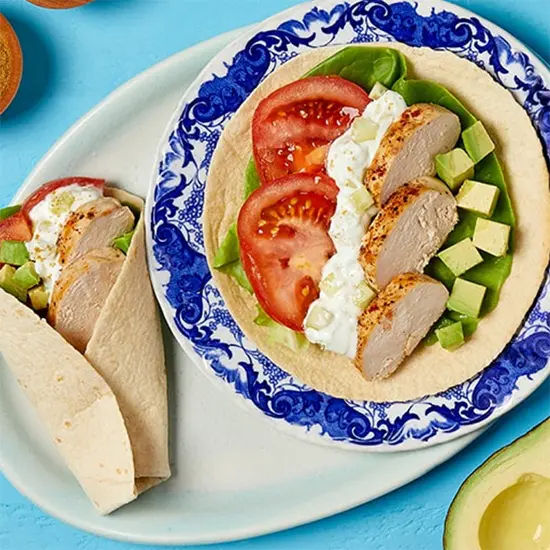 Chicken wrap with fresh avocado and tomato