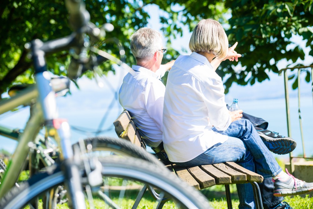 Senior woman and man at rest on bike trip sitting on a bench; Shutterstock ID 394812682; Business Division: Advanced Medical Nutrition; Business Unit: Benelux; Name: Danique van der Tas
