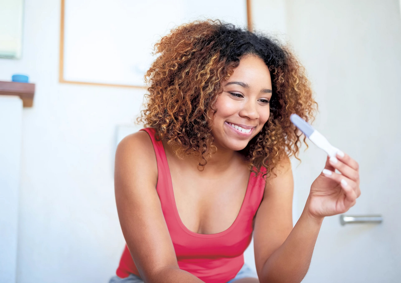 mum checking pregnancy test