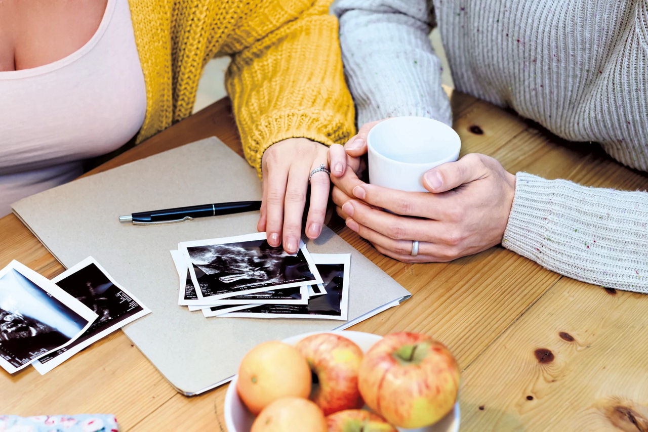 Two women looking at ultrasonic pictures