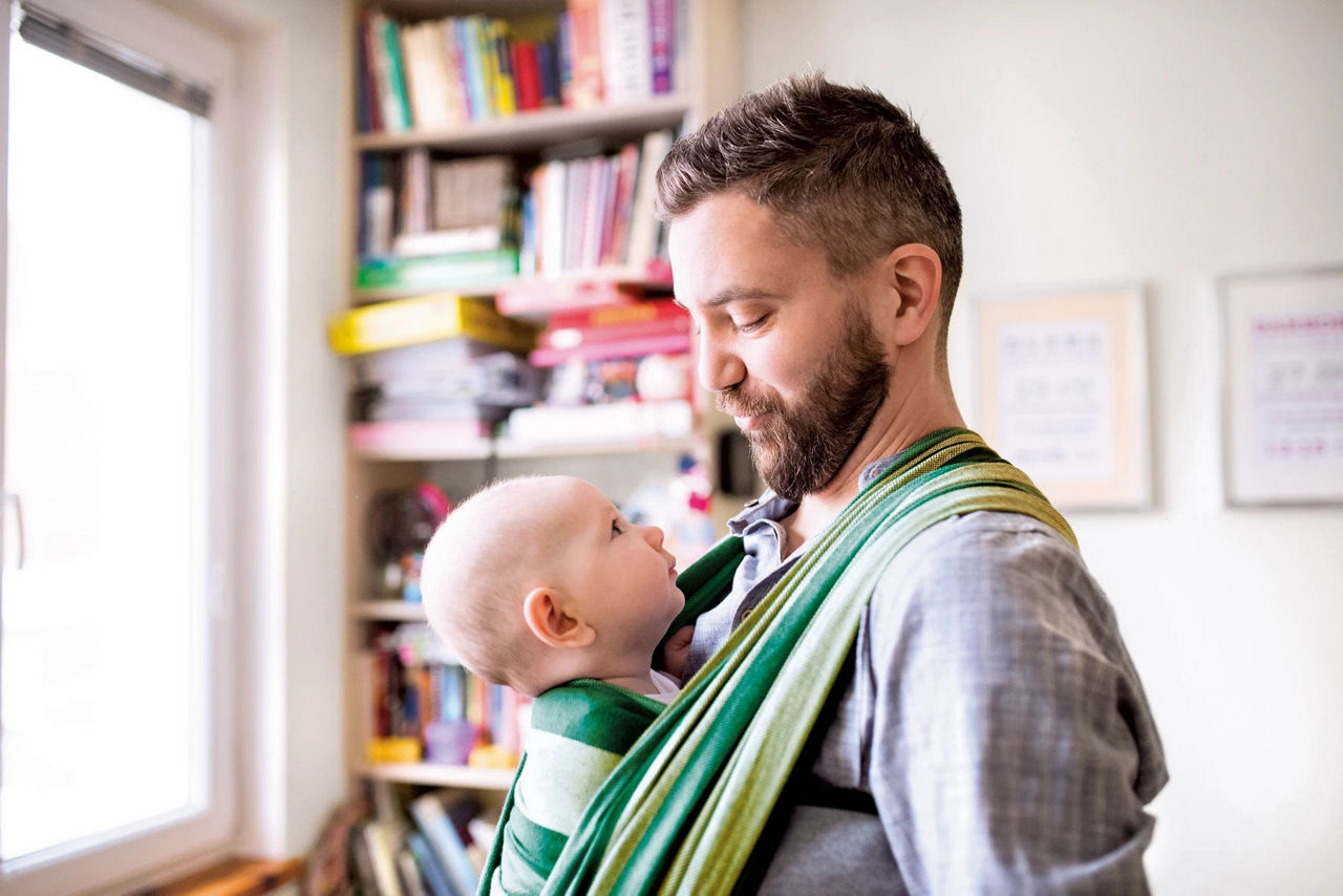 Dad holding baby