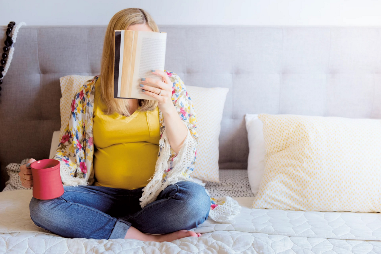 woman reading book
