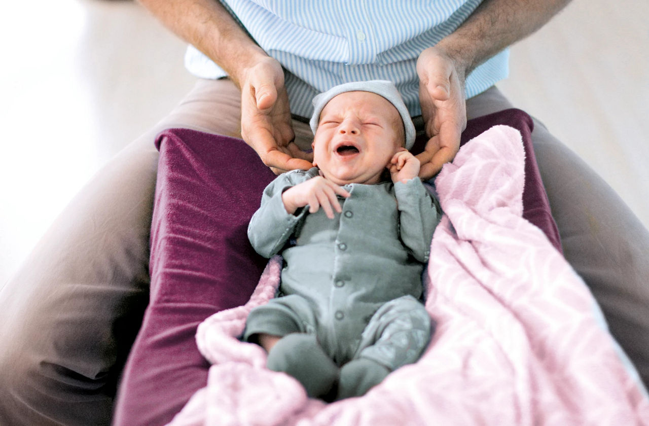 Dad and crying baby