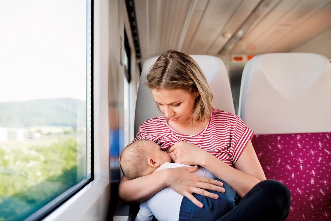 woman breastfeeding baby 
