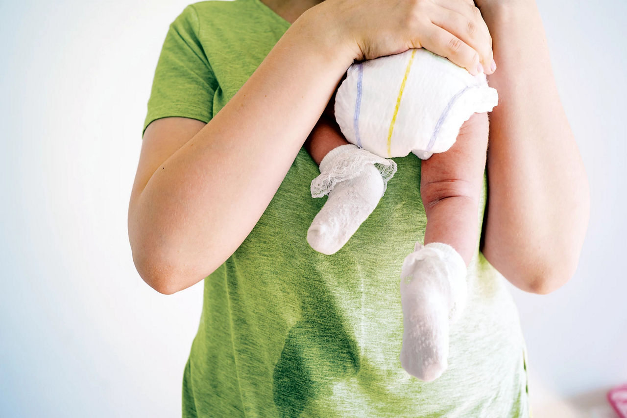 Mum holding baby