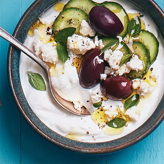 Mediterranean yogurt bowl with fresh toppings