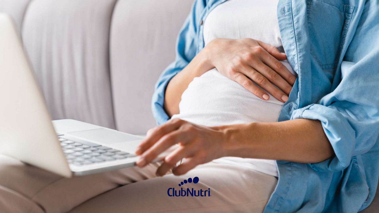 Breastfeeding baby on bed