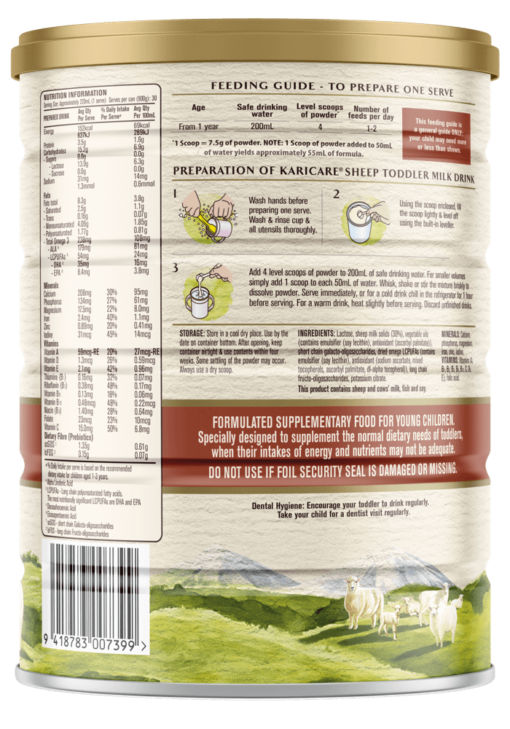 Back view of Karicare Sheep Toddler Milk powder can featuring preparation instructions and feeding guide. The packaging includes detailed nutritional information and usage directions. Visible text highlights 'Formulated supplementary food for young children' and '400g'. Pastoral visuals with sheep grazing in a green field are depicted at the bottom.