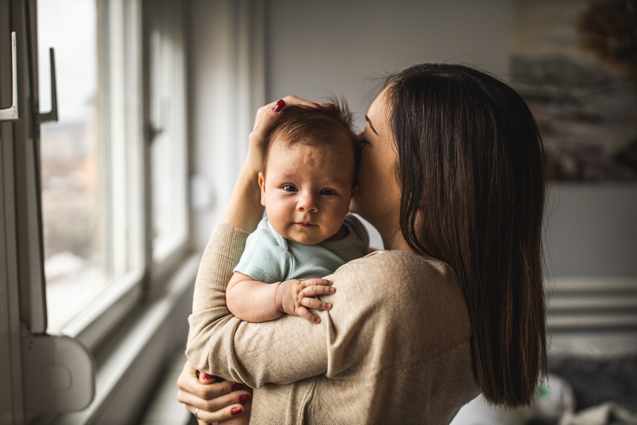 Cute baby girl and her mother