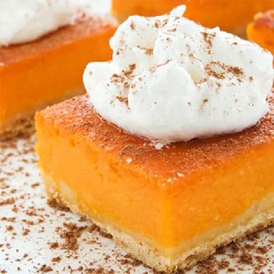 Pumpkin dessert squares with whipped cream