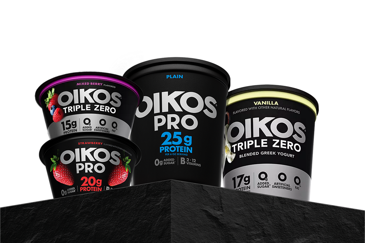A collection of Oikos Pro and Triple zero cups and quarts displayed on a black pedestal
