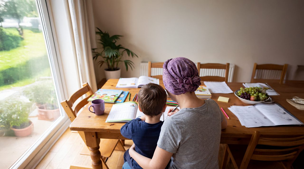 AI generated image of female cancer patient drawing with child on her lap.