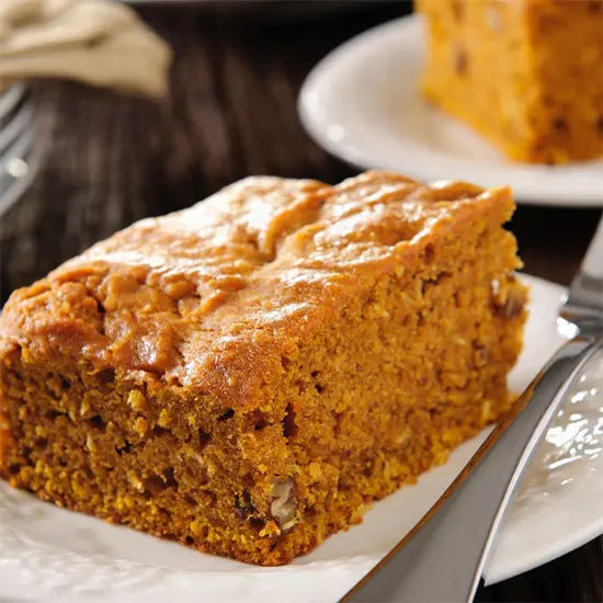 Pumpkin spice cake slice on plate