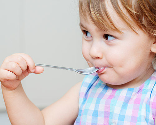 kid with spoon