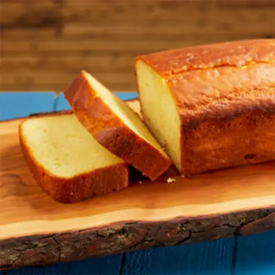 Freshly baked loaf on wooden board