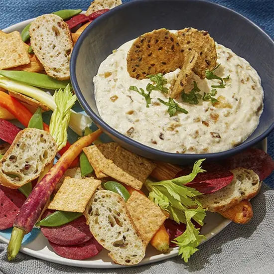 Warm artichoke and onion dip product