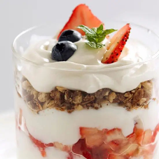 Layered yogurt parfait with fresh berries
