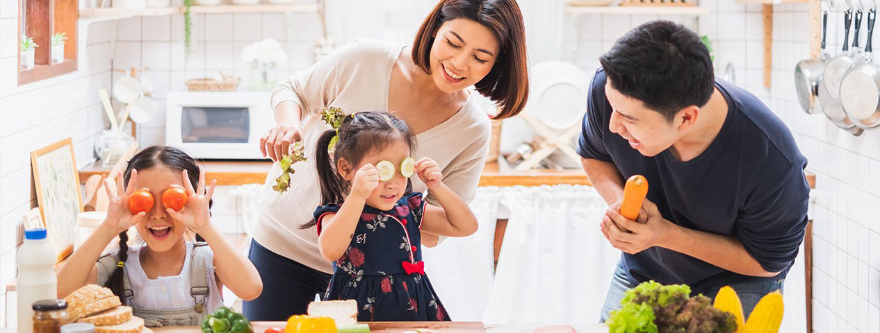 Family Picture Laughing In The Kitchen