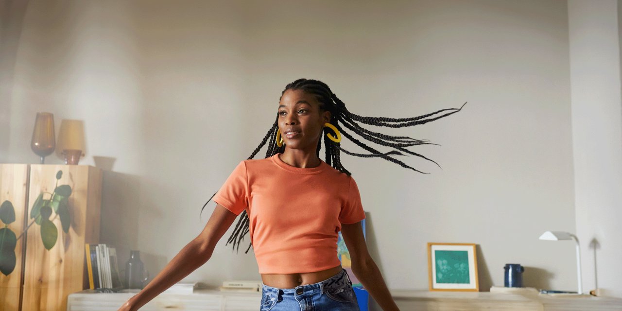 woman dancing in livingroom
