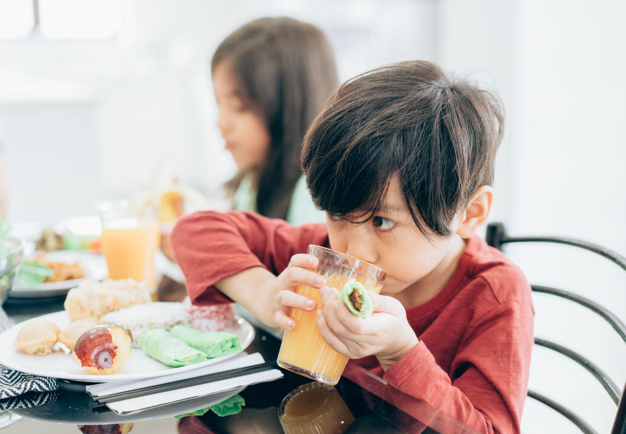 Boy drinking juice